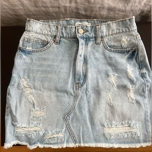 Light washed jean skirt. Never worn